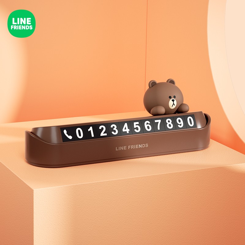 BROWN parking number plate